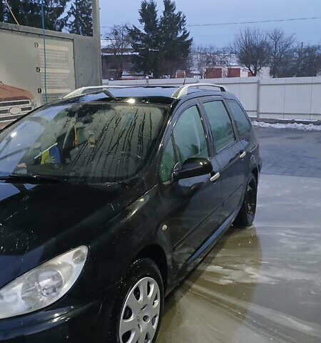 Черный Пежо 307, объемом двигателя 1.6 л и пробегом 293 тыс. км за 4400 $, фото 1 на Automoto.ua