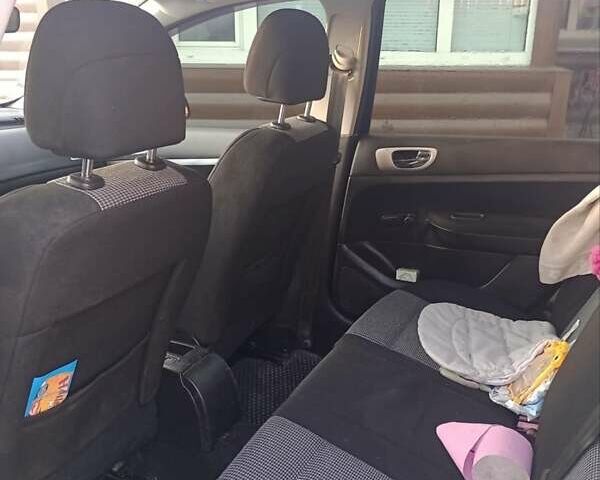 Черный Пежо 307, объемом двигателя 1.6 л и пробегом 187 тыс. км за 3600 $, фото 3 на Automoto.ua