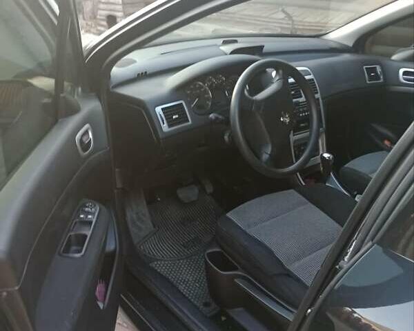 Черный Пежо 307, объемом двигателя 1.6 л и пробегом 187 тыс. км за 3600 $, фото 6 на Automoto.ua