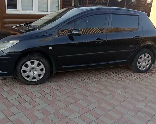 Черный Пежо 307, объемом двигателя 1.6 л и пробегом 187 тыс. км за 3600 $, фото 1 на Automoto.ua