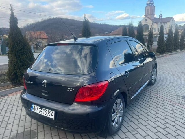 Черный Пежо 307, объемом двигателя 2 л и пробегом 300 тыс. км за 3800 $, фото 4 на Automoto.ua