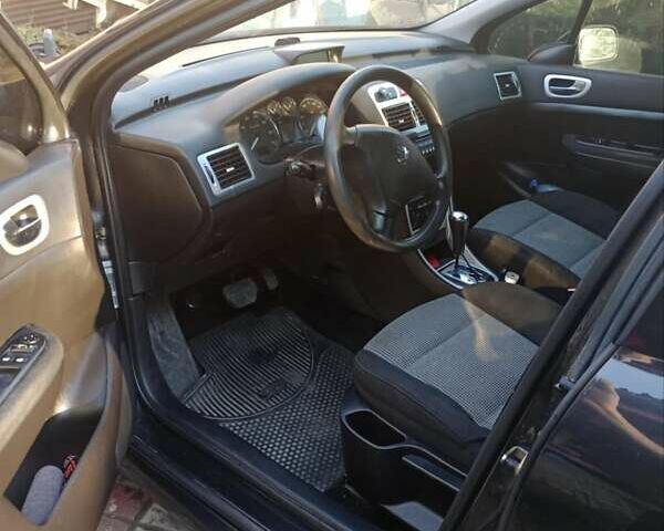 Черный Пежо 307, объемом двигателя 1.6 л и пробегом 187 тыс. км за 3600 $, фото 5 на Automoto.ua