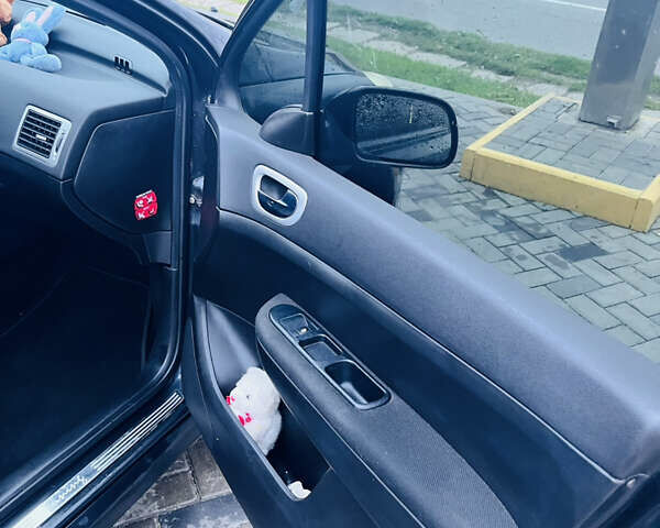 Черный Пежо 307, объемом двигателя 2 л и пробегом 219 тыс. км за 3600 $, фото 14 на Automoto.ua