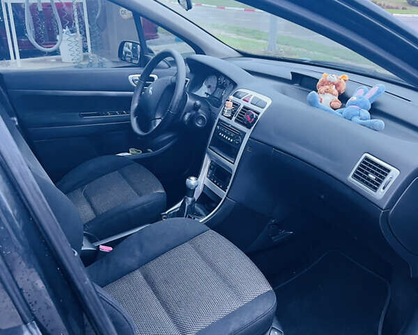 Черный Пежо 307, объемом двигателя 2 л и пробегом 219 тыс. км за 3600 $, фото 15 на Automoto.ua