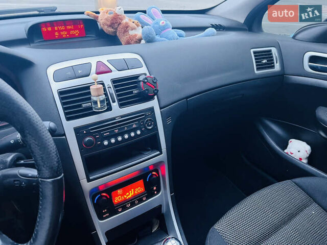 Черный Пежо 307, объемом двигателя 2 л и пробегом 219 тыс. км за 3600 $, фото 11 на Automoto.ua