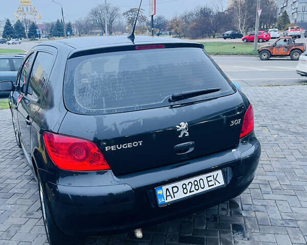 Черный Пежо 307, объемом двигателя 2 л и пробегом 219 тыс. км за 3600 $, фото 7 на Automoto.ua