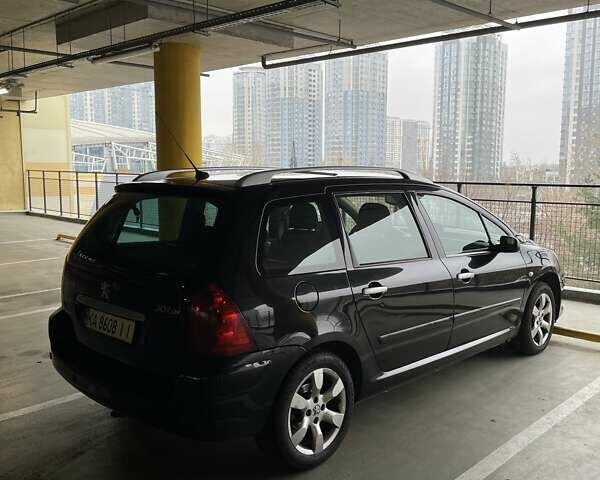 Черный Пежо 307, объемом двигателя 2 л и пробегом 280 тыс. км за 5500 $, фото 7 на Automoto.ua
