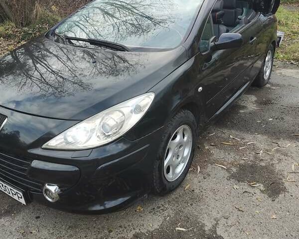 Черный Пежо 307, объемом двигателя 2 л и пробегом 185 тыс. км за 5300 $, фото 11 на Automoto.ua