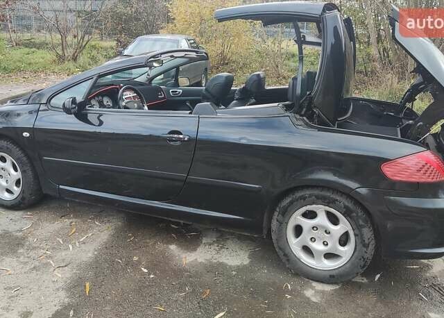 Черный Пежо 307, объемом двигателя 2 л и пробегом 185 тыс. км за 5300 $, фото 12 на Automoto.ua