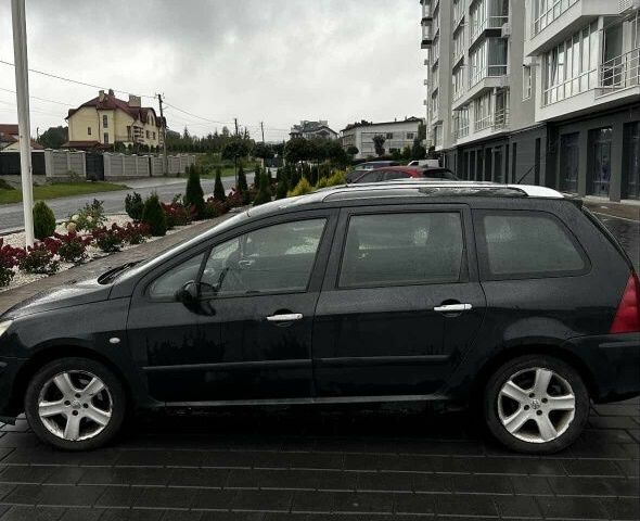 Черный Пежо 307, объемом двигателя 0 л и пробегом 300 тыс. км за 1500 $, фото 3 на Automoto.ua