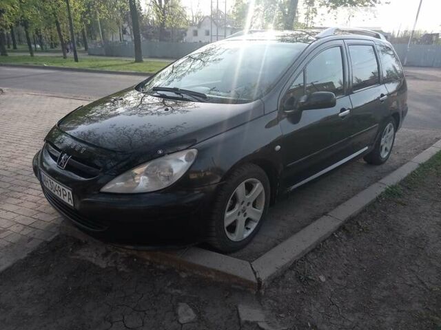 Чорний Пежо 307, об'ємом двигуна 2 л та пробігом 326 тис. км за 3999 $, фото 4 на Automoto.ua