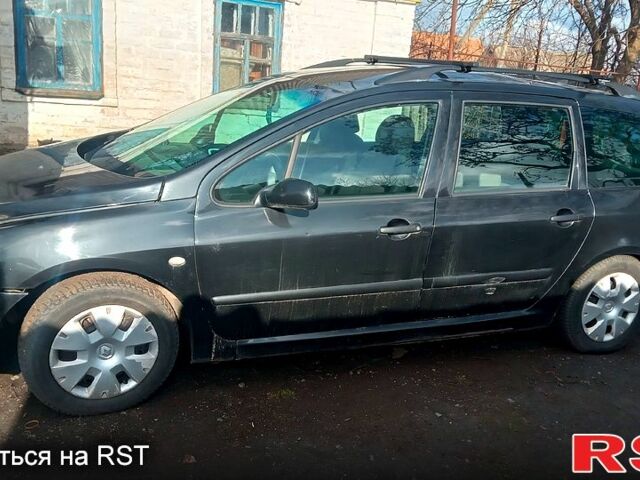 Черный Пежо 307, объемом двигателя 2 л и пробегом 264 тыс. км за 2500 $, фото 10 на Automoto.ua