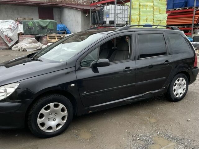Чорний Пежо 307, об'ємом двигуна 1.4 л та пробігом 385 тис. км за 3350 $, фото 1 на Automoto.ua
