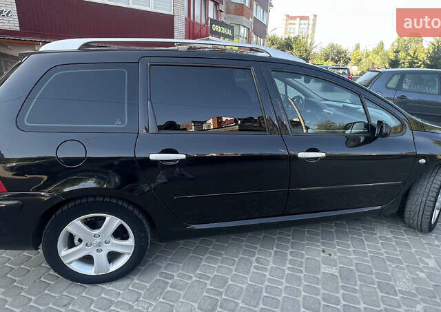 Черный Пежо 307, объемом двигателя 1.59 л и пробегом 232 тыс. км за 3900 $, фото 17 на Automoto.ua