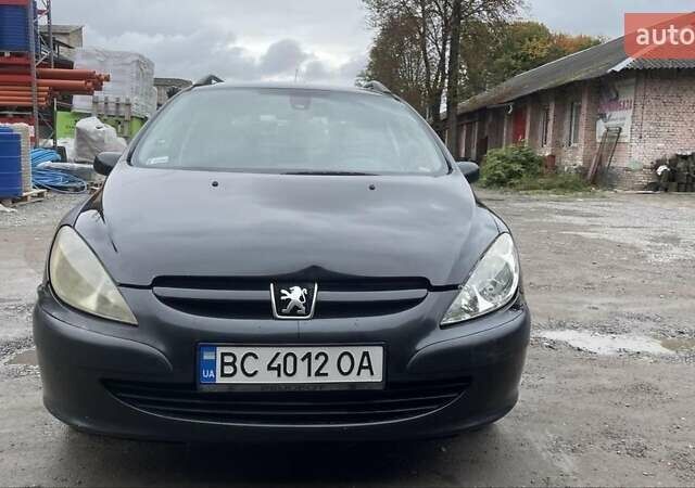 Чорний Пежо 307, об'ємом двигуна 1.4 л та пробігом 385 тис. км за 3350 $, фото 1 на Automoto.ua