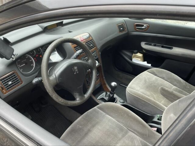 Чорний Пежо 307, об'ємом двигуна 1.4 л та пробігом 385 тис. км за 3350 $, фото 4 на Automoto.ua