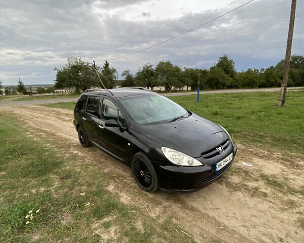 Черный Пежо 307, объемом двигателя 2 л и пробегом 258 тыс. км за 3300 $, фото 2 на Automoto.ua