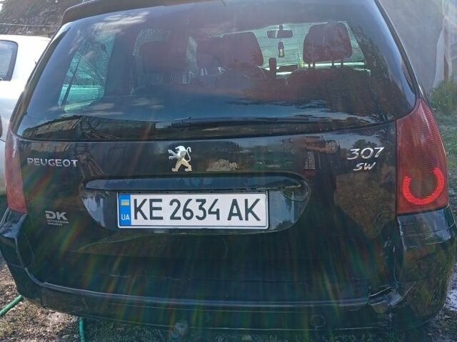 Черный Пежо 307, объемом двигателя 2 л и пробегом 235 тыс. км за 4200 $, фото 4 на Automoto.ua