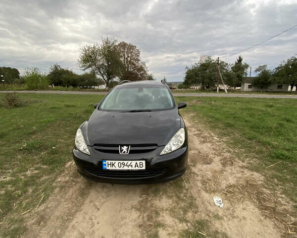 Черный Пежо 307, объемом двигателя 2 л и пробегом 258 тыс. км за 3300 $, фото 4 на Automoto.ua
