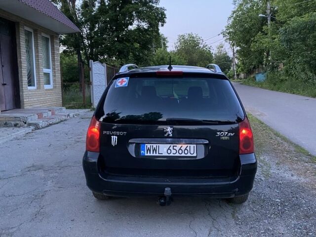 Черный Пежо 307, объемом двигателя 2 л и пробегом 334 тыс. км за 1950 $, фото 2 на Automoto.ua
