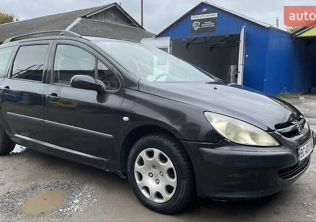 Чорний Пежо 307, об'ємом двигуна 1.4 л та пробігом 385 тис. км за 3350 $, фото 7 на Automoto.ua