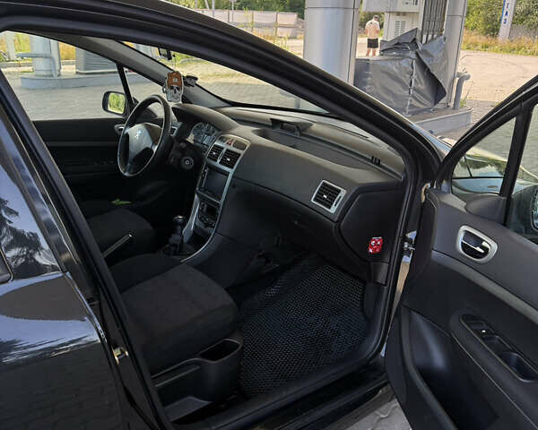 Черный Пежо 307, объемом двигателя 1.59 л и пробегом 250 тыс. км за 4250 $, фото 6 на Automoto.ua