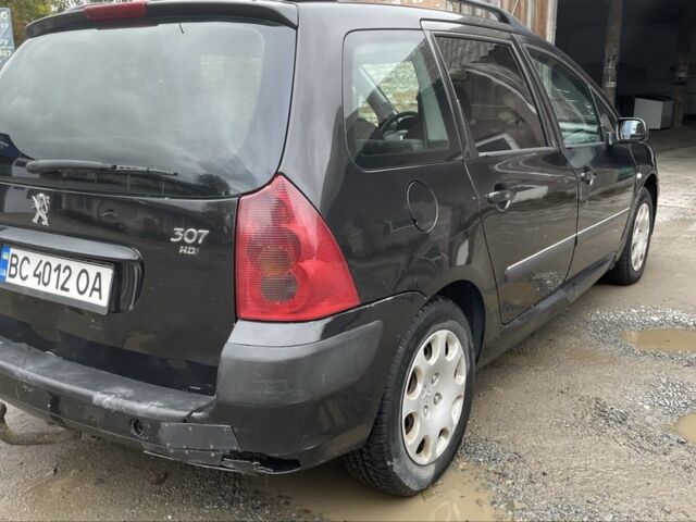 Чорний Пежо 307, об'ємом двигуна 1.4 л та пробігом 385 тис. км за 3350 $, фото 3 на Automoto.ua