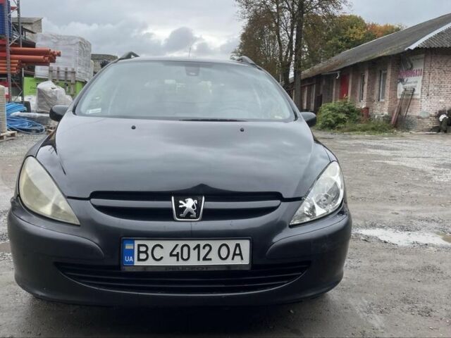 Чорний Пежо 307, об'ємом двигуна 1.4 л та пробігом 385 тис. км за 3350 $, фото 2 на Automoto.ua