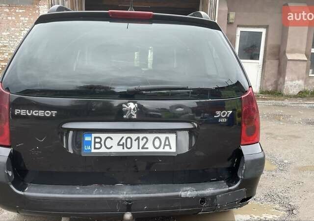 Чорний Пежо 307, об'ємом двигуна 1.4 л та пробігом 385 тис. км за 3350 $, фото 4 на Automoto.ua