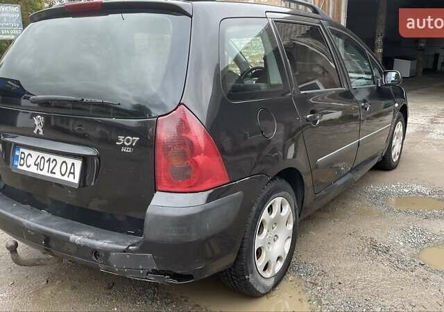 Чорний Пежо 307, об'ємом двигуна 1.4 л та пробігом 385 тис. км за 3350 $, фото 2 на Automoto.ua