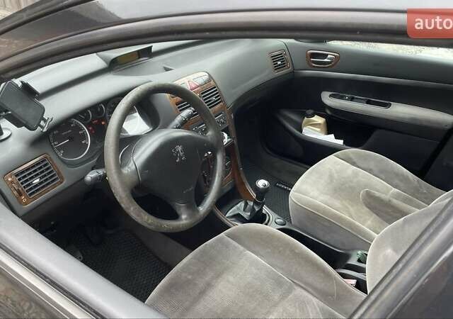 Чорний Пежо 307, об'ємом двигуна 1.4 л та пробігом 385 тис. км за 3350 $, фото 3 на Automoto.ua