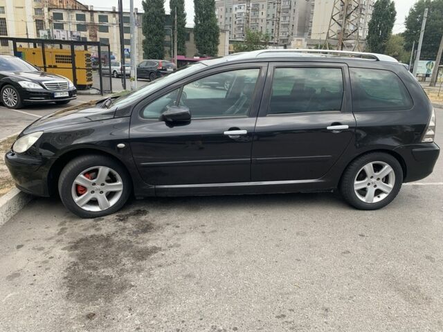 Черный Пежо 307, объемом двигателя 2 л и пробегом 283 тыс. км за 4700 $, фото 8 на Automoto.ua