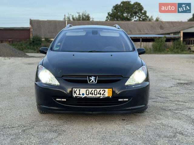 Черный Пежо 307, объемом двигателя 1.6 л и пробегом 202 тыс. км за 3950 $, фото 11 на Automoto.ua