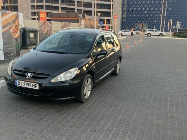 Черный Пежо 307, объемом двигателя 2 л и пробегом 283 тыс. км за 4700 $, фото 6 на Automoto.ua