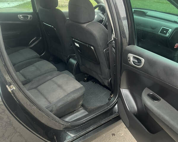 Черный Пежо 307, объемом двигателя 1.56 л и пробегом 285 тыс. км за 4200 $, фото 9 на Automoto.ua