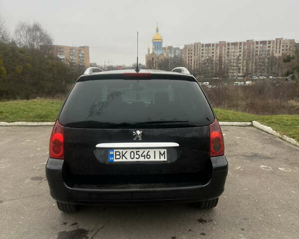 Черный Пежо 307, объемом двигателя 1.56 л и пробегом 285 тыс. км за 4200 $, фото 4 на Automoto.ua