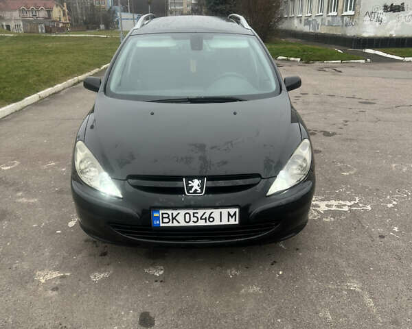 Черный Пежо 307, объемом двигателя 1.56 л и пробегом 285 тыс. км за 4200 $, фото 1 на Automoto.ua