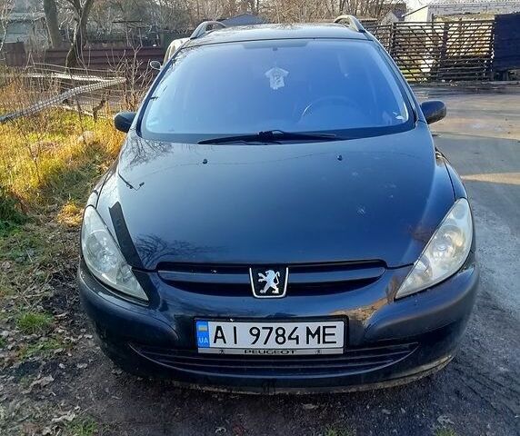 Черный Пежо 307, объемом двигателя 1.6 л и пробегом 190 тыс. км за 2650 $, фото 4 на Automoto.ua