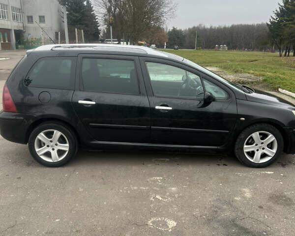 Черный Пежо 307, объемом двигателя 1.56 л и пробегом 285 тыс. км за 4200 $, фото 6 на Automoto.ua