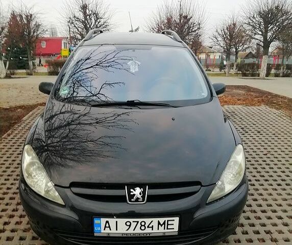 Черный Пежо 307, объемом двигателя 1.6 л и пробегом 190 тыс. км за 2650 $, фото 1 на Automoto.ua
