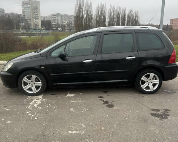 Черный Пежо 307, объемом двигателя 1.56 л и пробегом 285 тыс. км за 4200 $, фото 2 на Automoto.ua