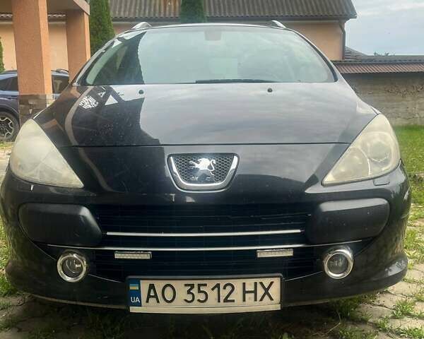 Черный Пежо 307, объемом двигателя 2 л и пробегом 233 тыс. км за 6100 $, фото 6 на Automoto.ua