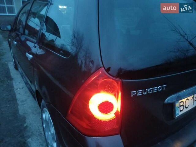 Черный Пежо 307, объемом двигателя 1.6 л и пробегом 347 тыс. км за 4440 $, фото 13 на Automoto.ua