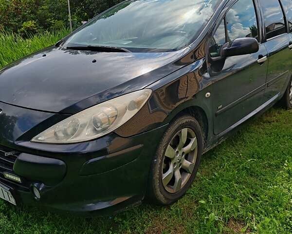 Чорний Пежо 307, об'ємом двигуна 1.56 л та пробігом 380 тис. км за 2500 $, фото 6 на Automoto.ua