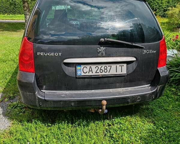 Чорний Пежо 307, об'ємом двигуна 1.56 л та пробігом 380 тис. км за 2500 $, фото 7 на Automoto.ua