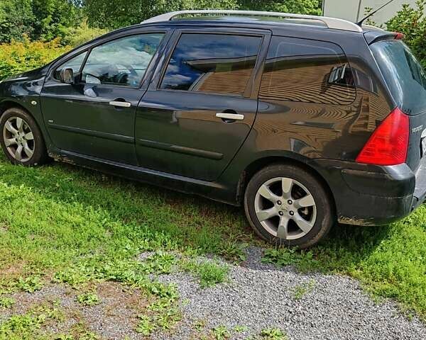 Чорний Пежо 307, об'ємом двигуна 1.56 л та пробігом 380 тис. км за 2500 $, фото 8 на Automoto.ua
