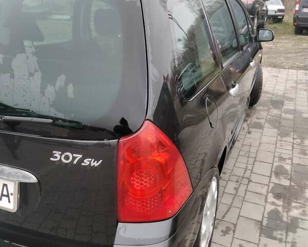 Черный Пежо 307, объемом двигателя 1.6 л и пробегом 347 тыс. км за 4440 $, фото 6 на Automoto.ua