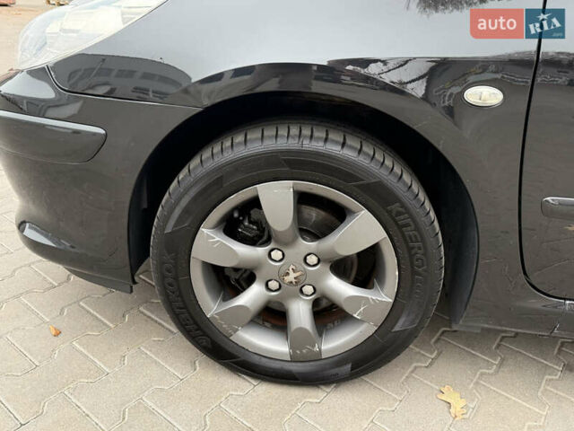 Чорний Пежо 307, об'ємом двигуна 1.6 л та пробігом 256 тис. км за 4700 $, фото 5 на Automoto.ua