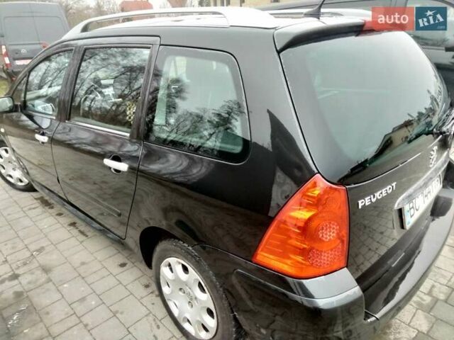 Черный Пежо 307, объемом двигателя 1.6 л и пробегом 347 тыс. км за 4440 $, фото 4 на Automoto.ua