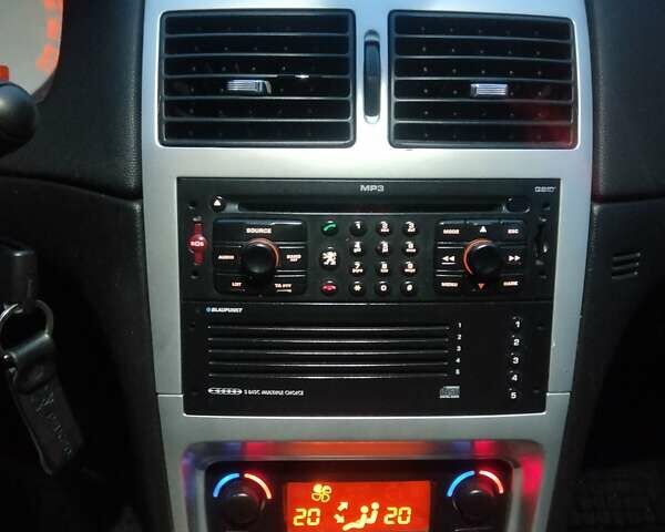 Черный Пежо 307, объемом двигателя 1.6 л и пробегом 347 тыс. км за 4440 $, фото 19 на Automoto.ua